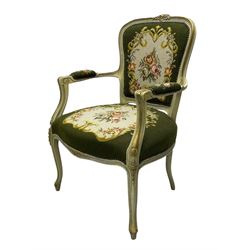 Near pair of French Louis XVI design lacquered hardwood-framed parlour elbow chairs, moulded flower head cresting rail over scrolled arm terminals, back and seat upholstered in green and olive floral and urn decorated tapestry fabric, on cabriole supports, in craquelure cream finish with painted gilt piping