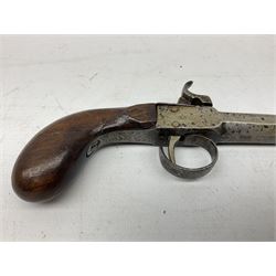 Mid 19th century double barrel percussion muff pistol, joined 7cm octagonal barrels with walnut stock19cm overall; a matching single barrel muff pistol 17cm overall (2)