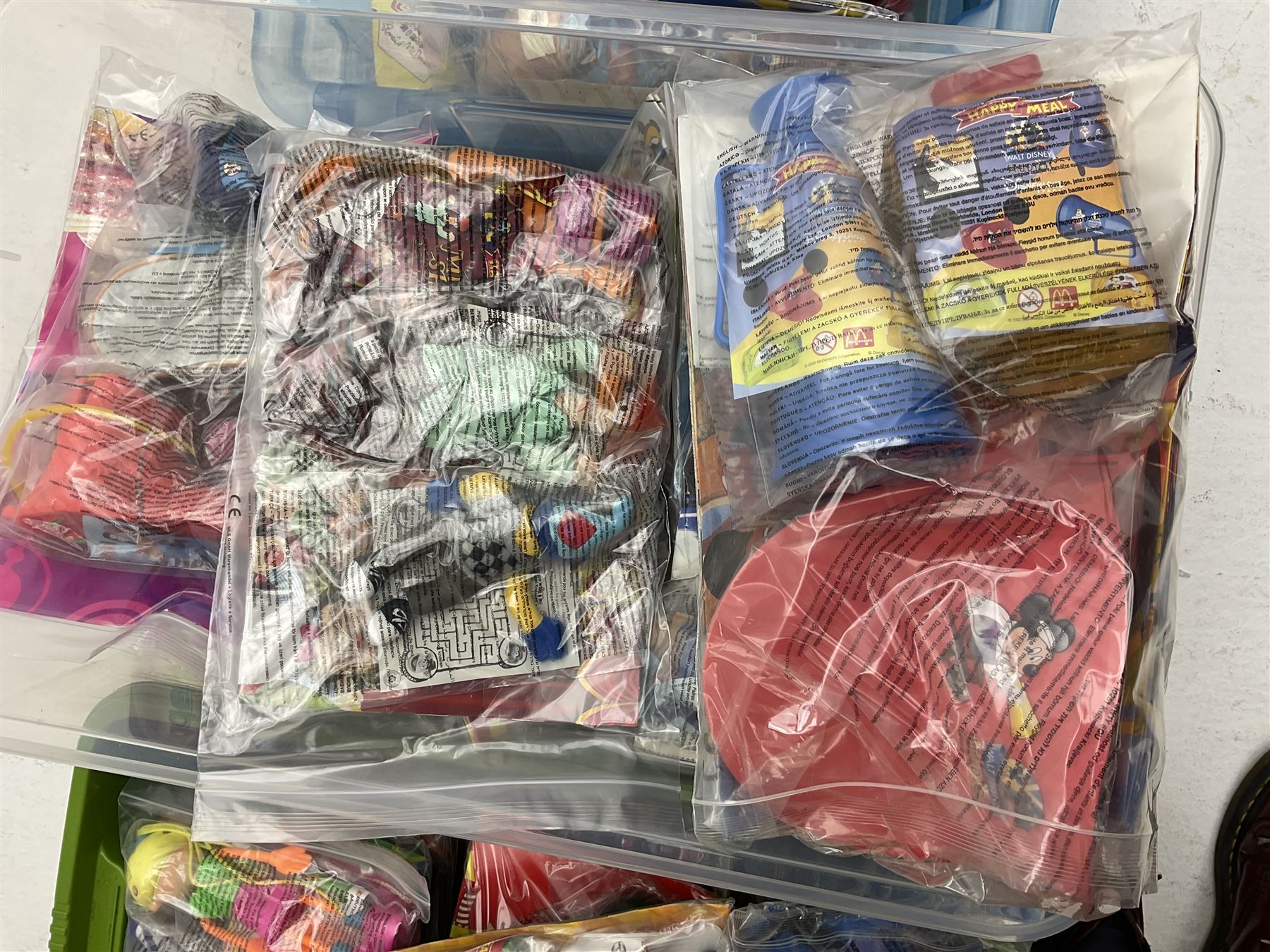 Large quantity of Mcdonalds toys in three boxes