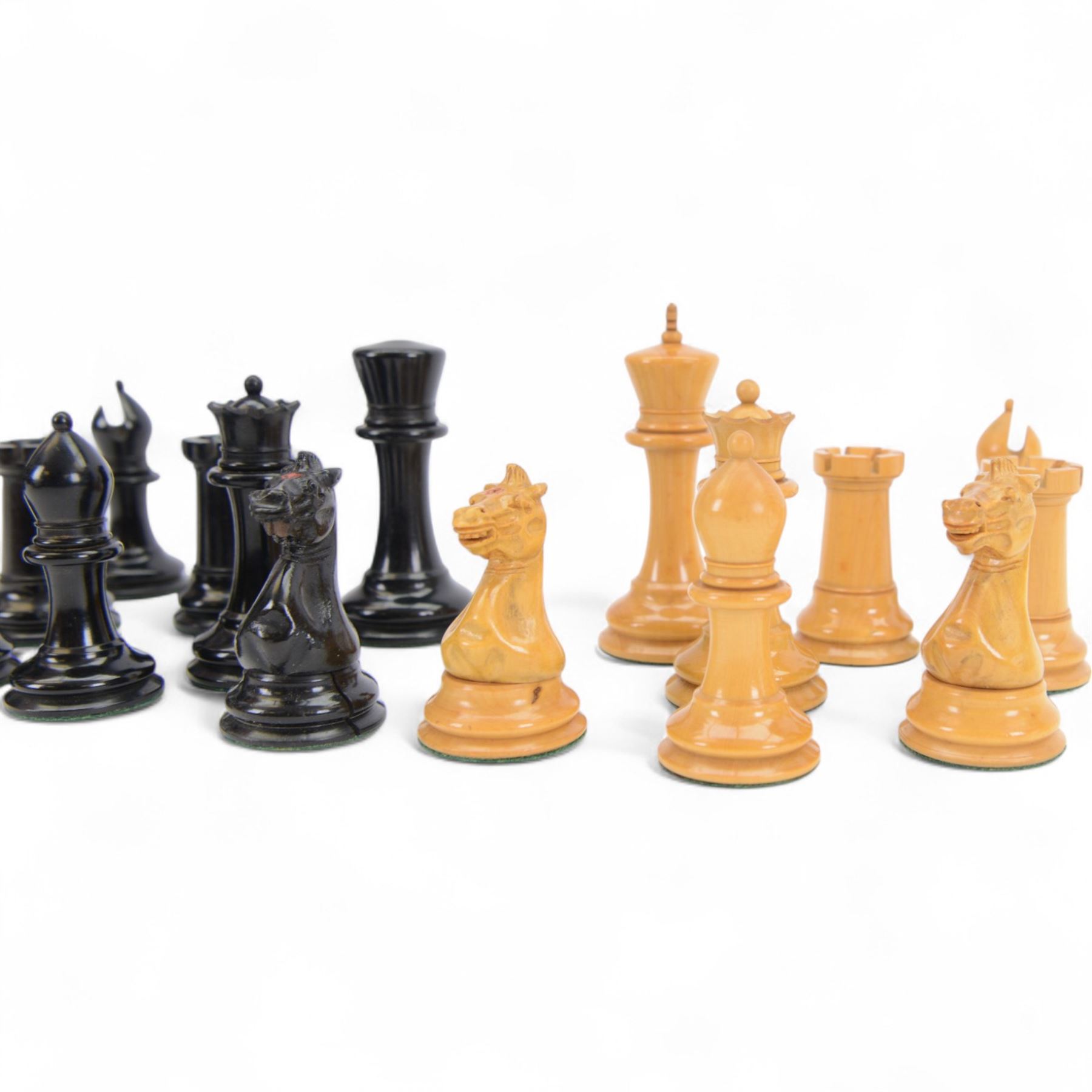 Jaques 'The Staunton Chess-Men' boxwood and ebony chess set, in original brass mounted mahogany box with paper label to interior, only the boxwood king stamped Jaques London, some pieces marked with red crown, boxwood king H11cm