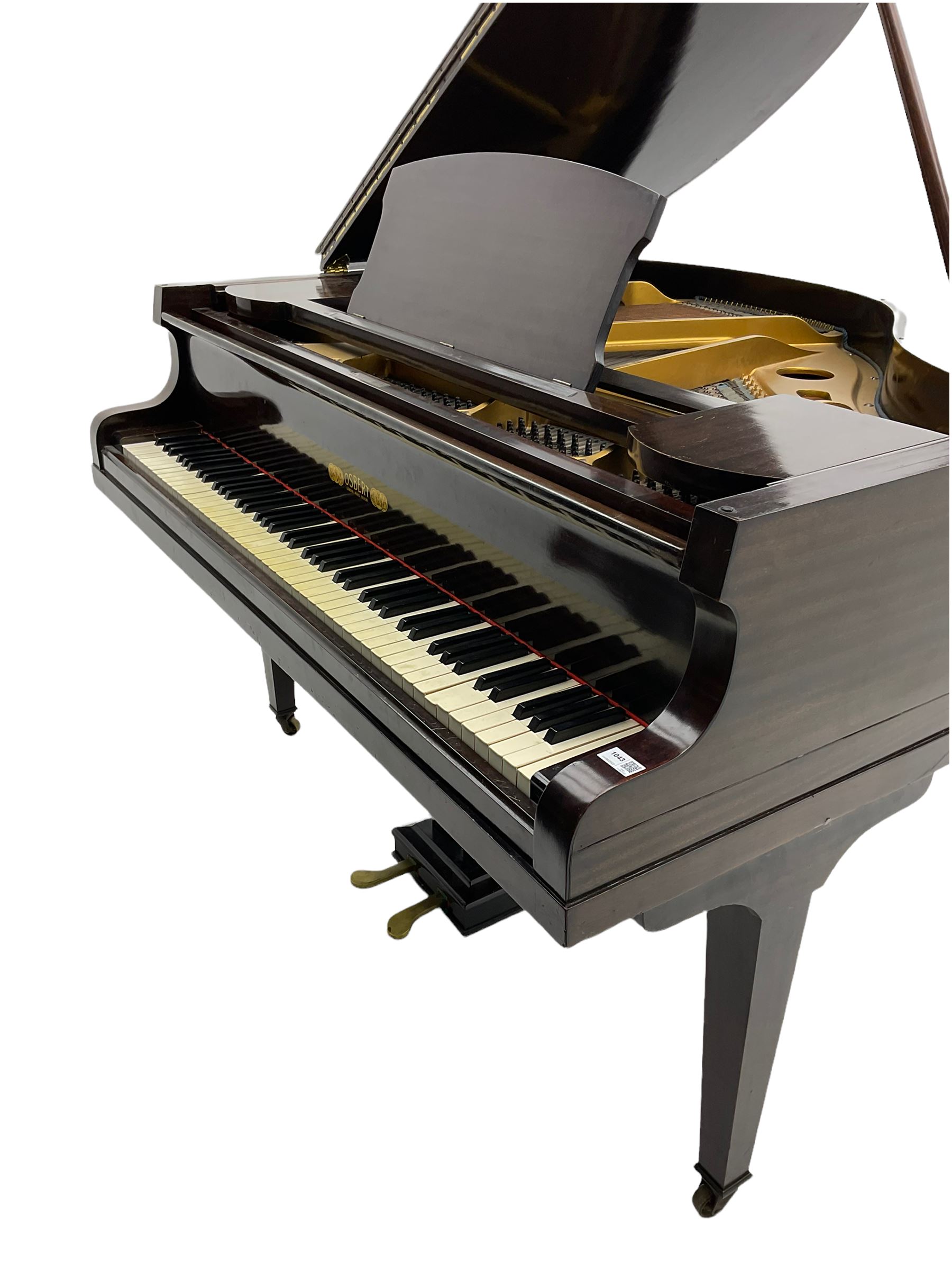 A mid 20th century English baby grand piano by Osbert, with an iron frame and overstrung stringing in a mahogany case,  conforming Lyre with sustain and una corda pedals and music desk, with original stringing, hammer action, dampers and felts, 7-1/4 octaves with 88 original ebony and ivory covered keys, with stool