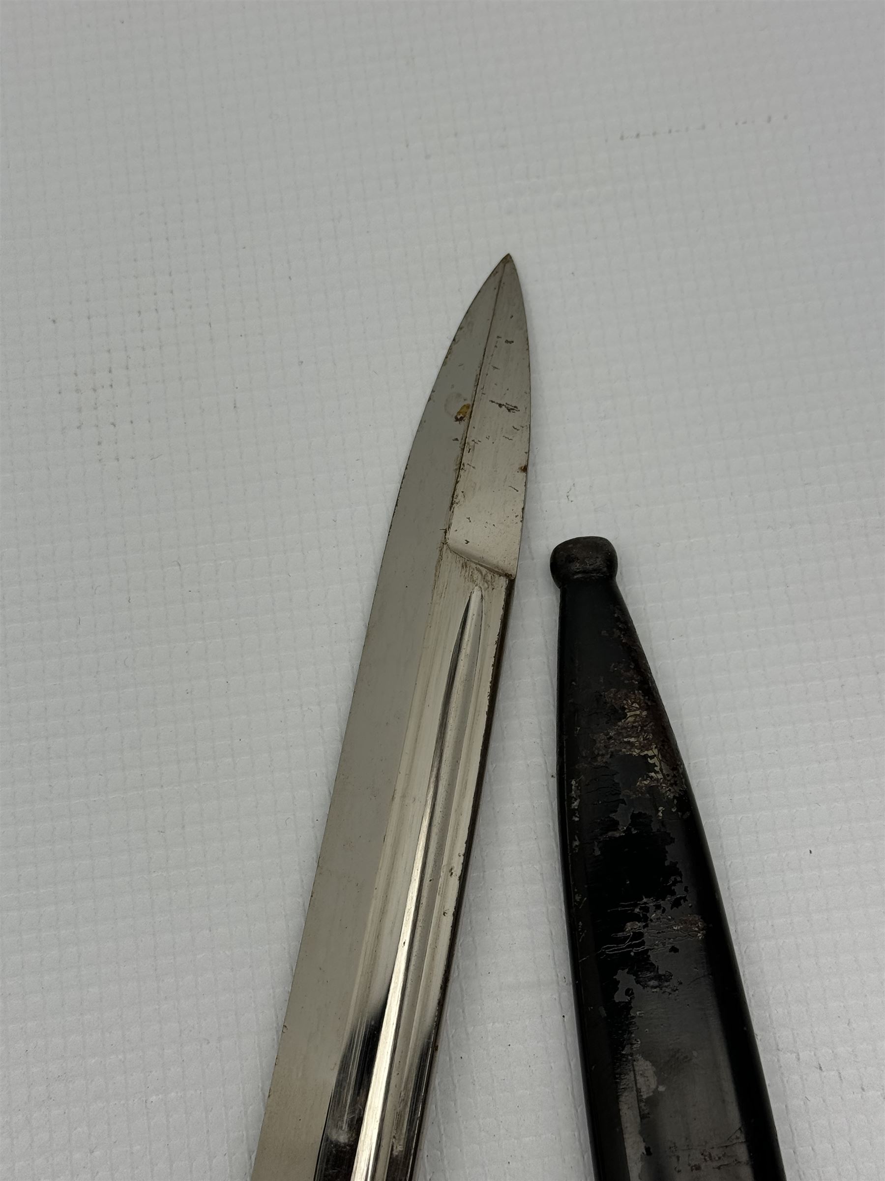 German Third Reich bayonet, the steel blade stamped E & F Horster, Solingen with black plastic chequered grip scales, L35cm