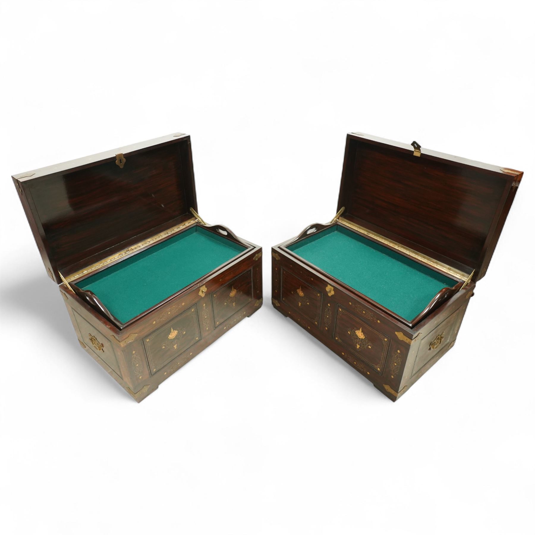 Pair of late 19th century colonial hardwood and brass inlaid chests, each rectangular with hinged top and brass strapping, floral and urn pattern inlay to the panels, with pierced brass side handles, fitted baize-lined butlers tray