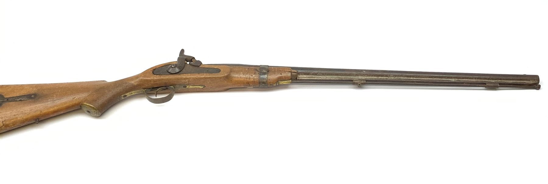 Indian ornamental percussion cap muzzle loading musket with walnut stock, chequered pistol grip, brass fittings and under barrel ramrod L112cm overall