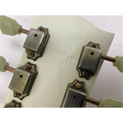 2010 Gibson Les Paul studio guitar, serial no101500537 in white finish with gold and pale green hardware, in Auden soft carry case, guitar L100cm