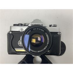 Collection of camera bodies and lenses, to include Olympus OM-1 camera body, serial no 106567, with 'Olympus OM-System F.Zuiko Auto-S 1:1.8 f=50mm' lens, serial no 135097,  Zenit-B camera body, serial no 71017867, with 'Helios-44-2 2/58' serial no 7500040, Voigtlander Vito B camera body, with 'Voigtlander Colour Skopar 1:2.8/50' lens, 'Olympus OM-System Zuiko Auto-Zoom 1:4 f=75-150mm' lens serial no 104321, 'Tamron SP 35-210mm 1:3.5-4.2' lens etc 