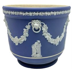 Victorian Wedgwood blue jasperware jardiniere H16.5cm; Victorian copper lustre jug; James Kent art deco style green glazed jug; and Beswick figure of a singing cat (4)