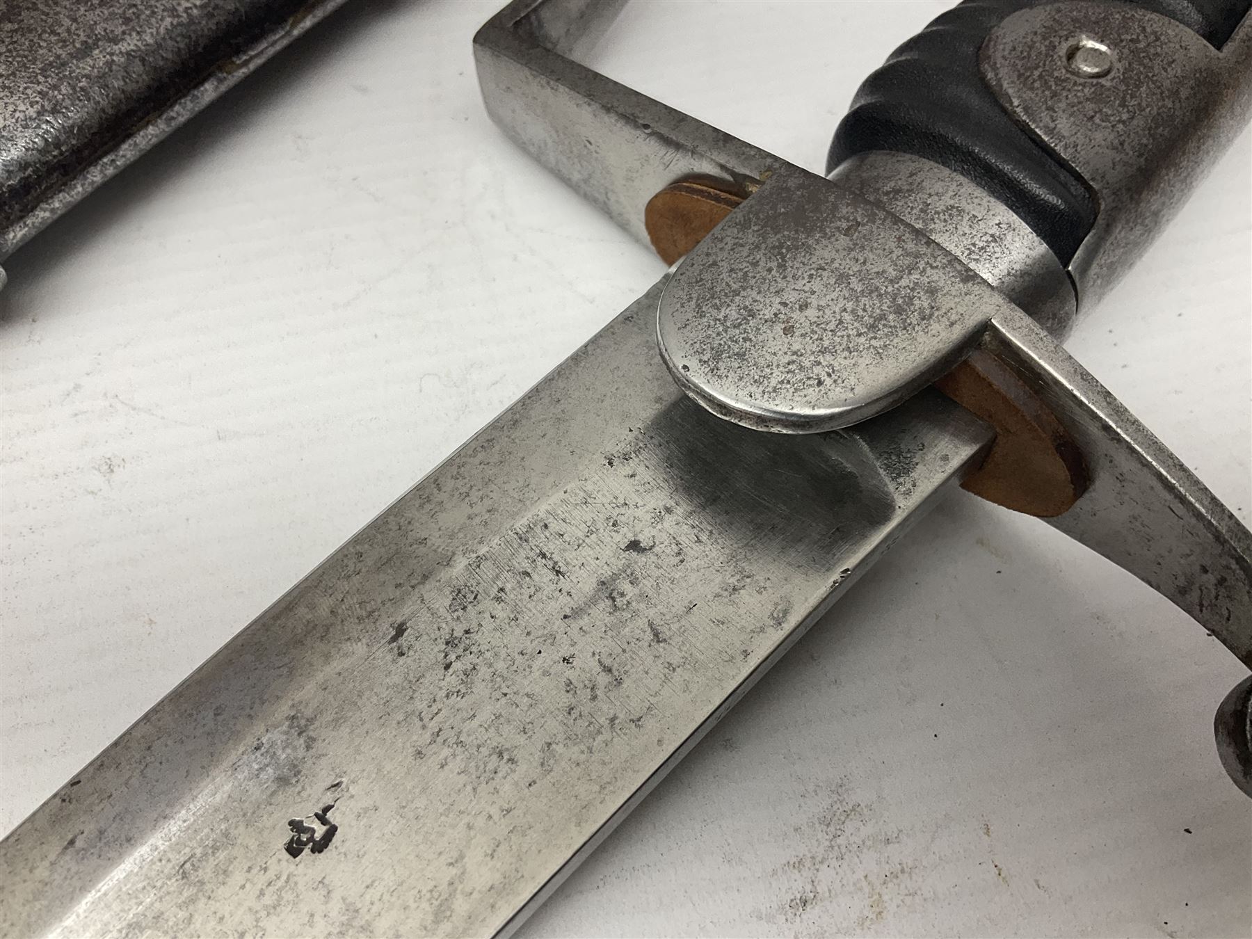 British 1796 Pattern Light Cavalry trooper's sword, the 84cm curving fullered blade stamped Hadley.1 to the back edge, steel hilt with knucklebow, D-shaped langets and leather grip; in polished steel scabbard stamped Osborn & Gunby Birmm. and W.R.16 ( ?16th Light Dragoons) with two suspension rings L100cm overall