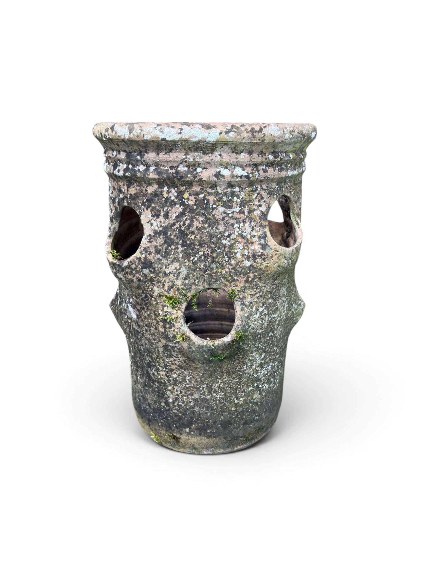 Set of five weathered terracotta strawberry pots, circular form with ribbed top