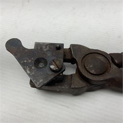 Two leather shot flasks with embossed decoration and brass nozzles; scissor action bullet mould with two ladles; pair of 19th century J.B. Warrilow hammer actions; small quantity of Staybrite buttons; and 1968 dated metal ammunition tin for 200 x 7.62 blank cartridges
