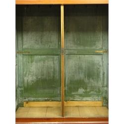  19th century scumbled pine doubled wardrobe, two panelled doors, green painted interior with hanging hooks, plinth base, W150cm, H188cm, D63cm  