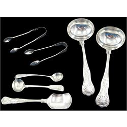 Group of silver flatware, comprising two Edwardian Kings pattern sauce ladles, hallmarked James Dixon & Sons Ltd, Sheffield 1903, two Victorian sugar tongs, hallmarked Holland, Son & Slater, London 1881, and Goldsmiths & Silversmiths Co, London 1893, two Georgian salt spoons, one example hallmarked John Meek, London 1826,  the other marked for London, makers mark and date letter worn and indistinct, and a sugar spoon, hallmarked Viner's Ltd, Sheffield 1956, approximate total weight 8.58 ozt (267 grams)