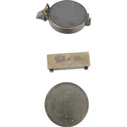 WWII British Plotting Field Instrument in Case, the metal instrument with ruled guide, used to calculate the fall of the shot from the gun stamped 'Plotter Field Mk IV W. Watson & Sons Ltd, No 8908 1939', in leather case marked 'Plotter Field MIV W. Guest & Co Ltd 1916', together with Watkin's compass clinometer, by J. Hicks, Hatton Garden, London, number 5640 and a trough compass 