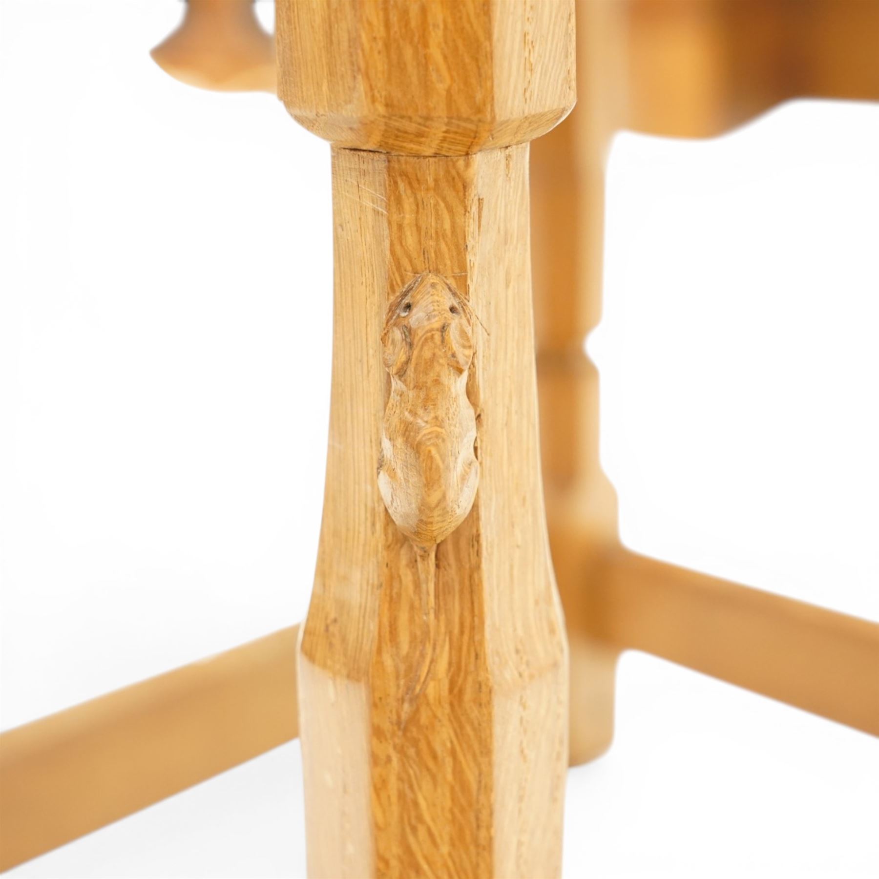 Mouseman - oak dressing table stool, the rectangular tan leather padded seat with studwork border, raised on octagonal supports united by box stretcher, carved with mouse signature, by the workshop of Robert Thompson of Kilburn