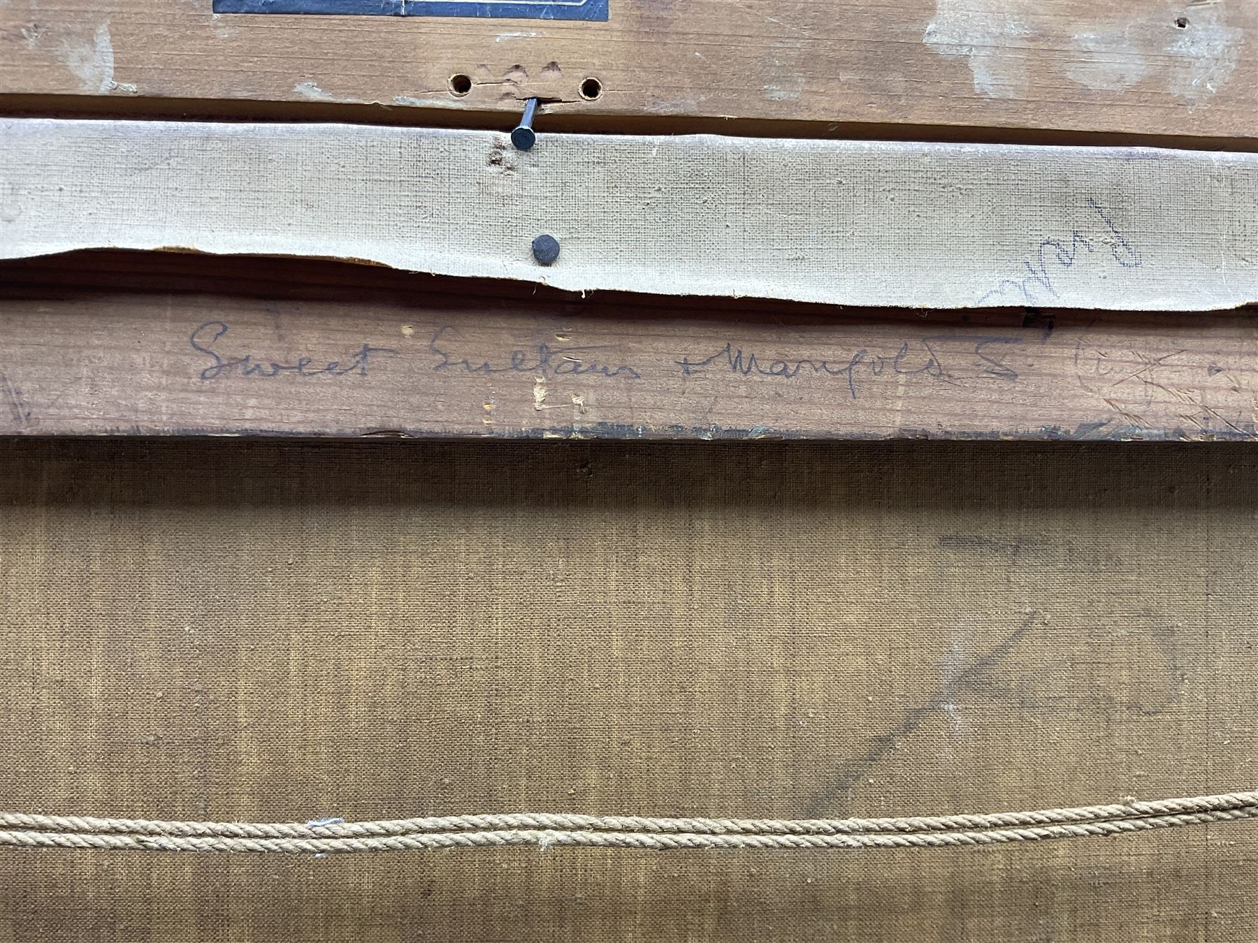 James Bolivar Manson (British 1879-1945): 'Sweet Sultans and Marigolds', oil on canvas unsigned, titled and dated 1945 in the artist's hand on label and on the stretcher verso, with James Bourlet & Sons label, 60cm x 50cm 
Notes: this is probably the artist's 1945 Royal Academy exhibit no.601, then titled 'Cornflowers and Marigolds' (sweet sultans being a variety of cornflower). The same jug depicted in the present picture can be seen in Manson's 1940 Royal Academy exhibit no.262 'Tulips and Daffodils'. The blue title label appears on a number of Manson's paintings.