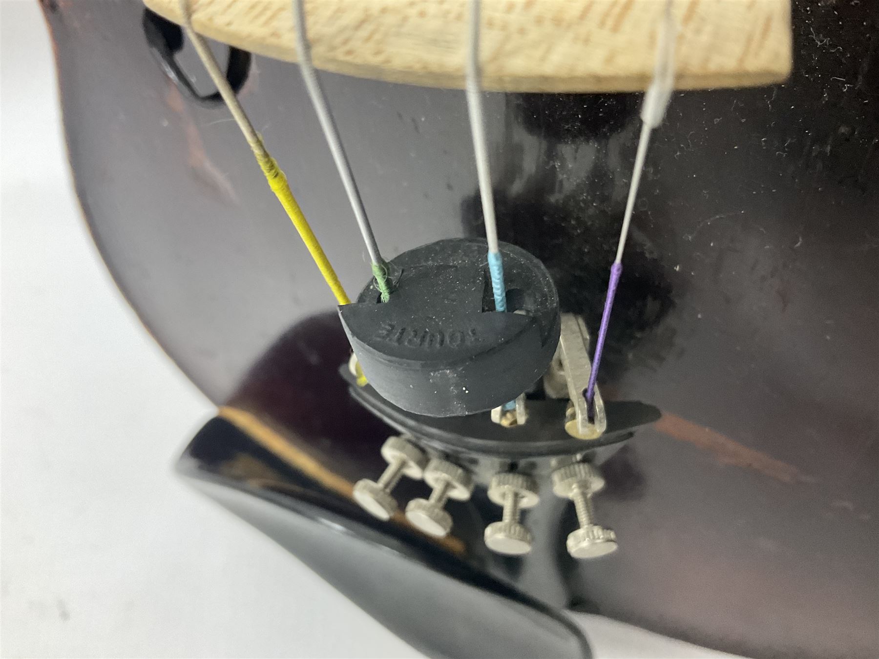 Neuner & Hornstiner early 20th century half size violin c1900, two piece maple back and ribs with a spruce top in a later ridged carrying case, no bow Length 57cm