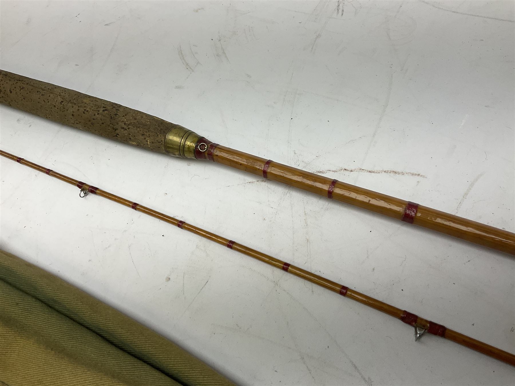 Hardy 'The Sir Edward Grey' two piece split can fishing rod, with cork handle and brass fittings marked Hardys, with a Hardy cover