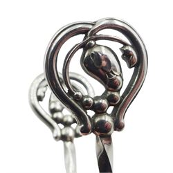 Pair of Danish silver sugar tongs by George Jensen, with pierced blossom handles, stamped George Jensen Sterling Denmark, approximate weight 27 grams