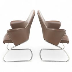 Four Senator executive cantilever chairs, upholstered in Padova hide, moulded back and integrated armrests, raised on a tubular chromed cantilever base