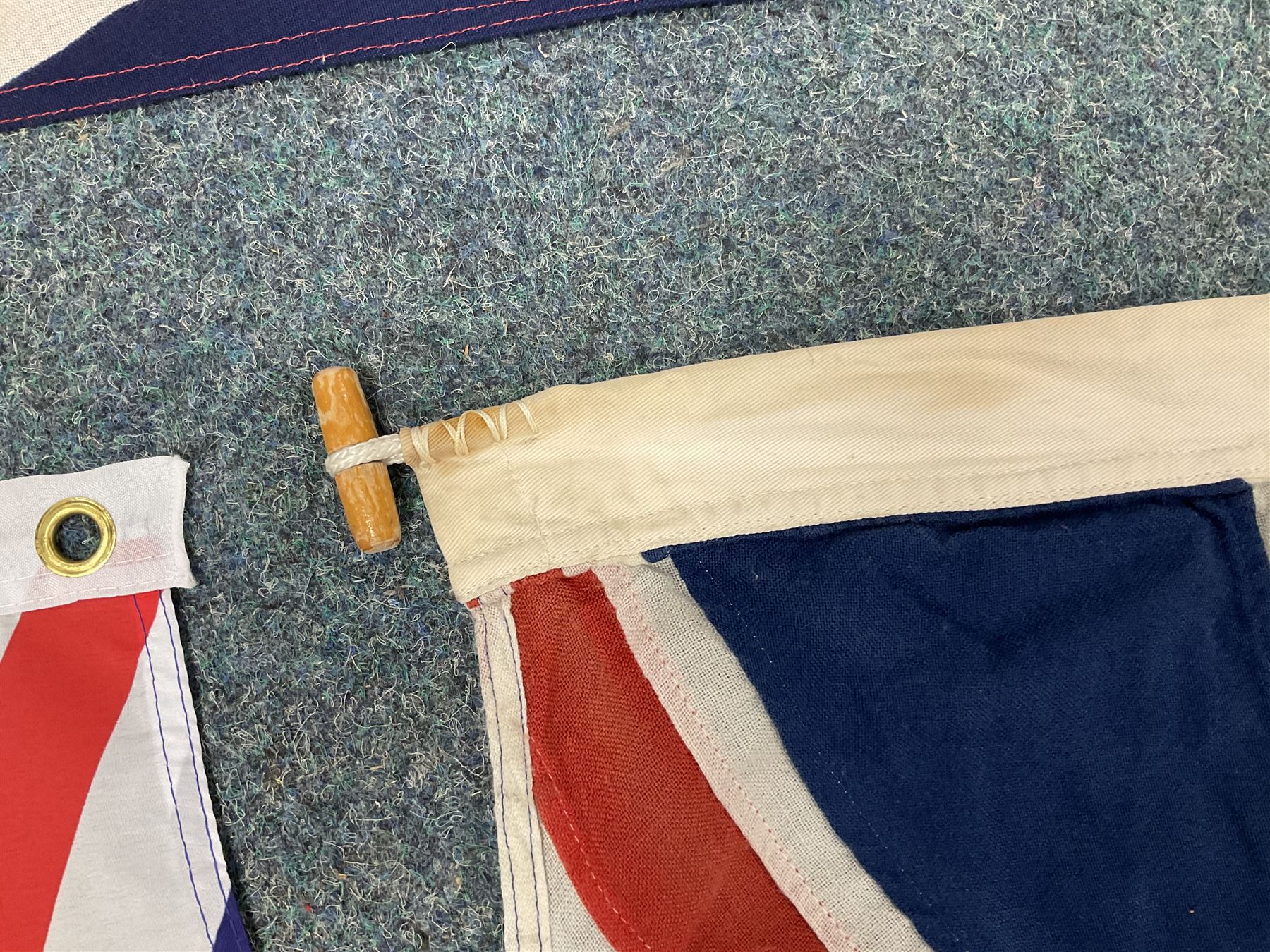 Six flags - White Ensign 180 x 86cm; two Union flags 180 x 86cm and 132 x 62cm; Falklands Islands 153 x 89cm; Yorkshire Rose 153 x 89cm; and QEII 1953 Coronation 84 x 57cm (6)