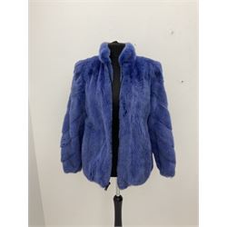 Modern cut lightweight skins lavender blue mink jacket, approx size 10 to 14, with elasticated cuffs, stand up small collar, black satin style lining, zip fastener, perfect condition as new, top class mink.
