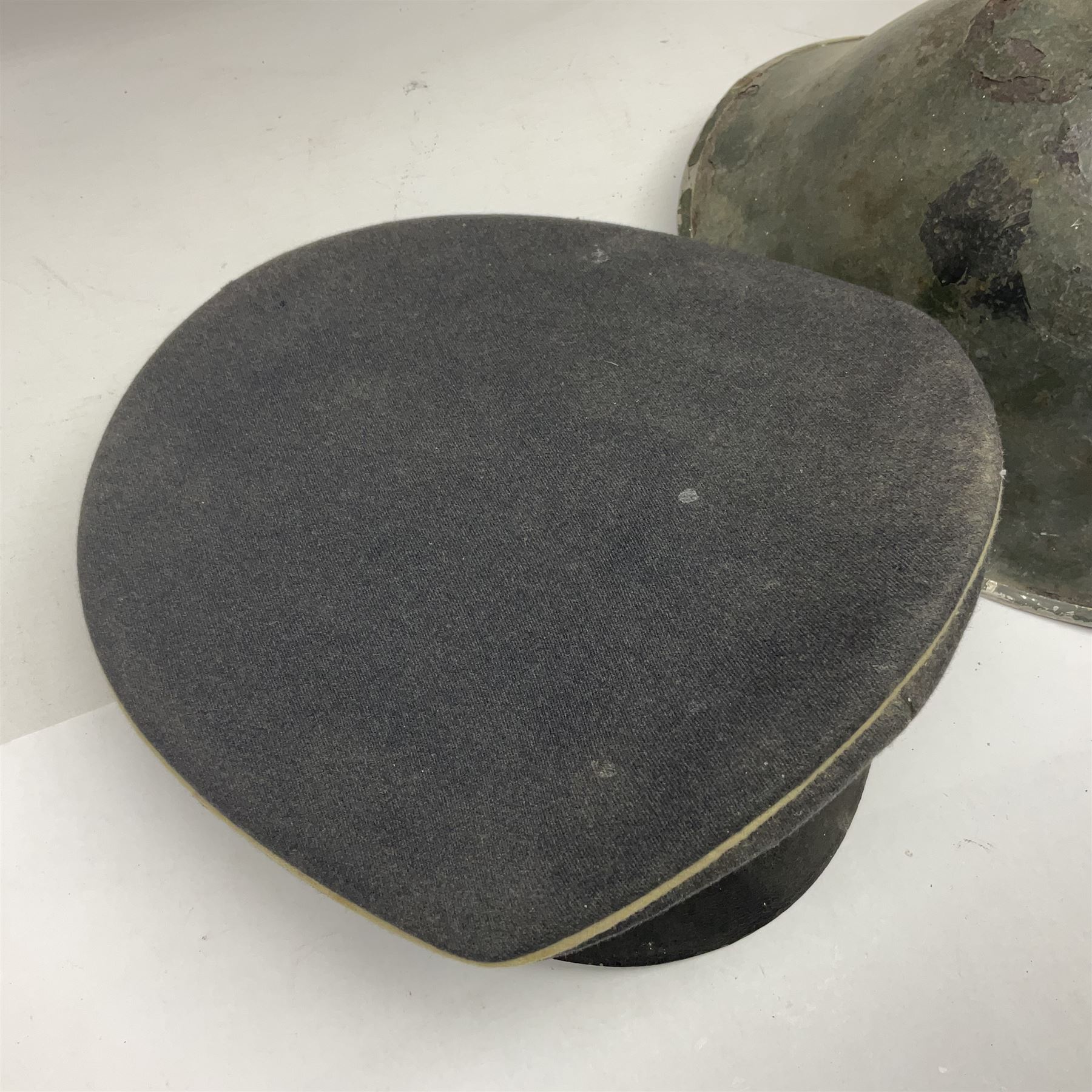 Two air force jackets, together with two helmets and Bamberger Mutzen Industrie German military hat and two others 