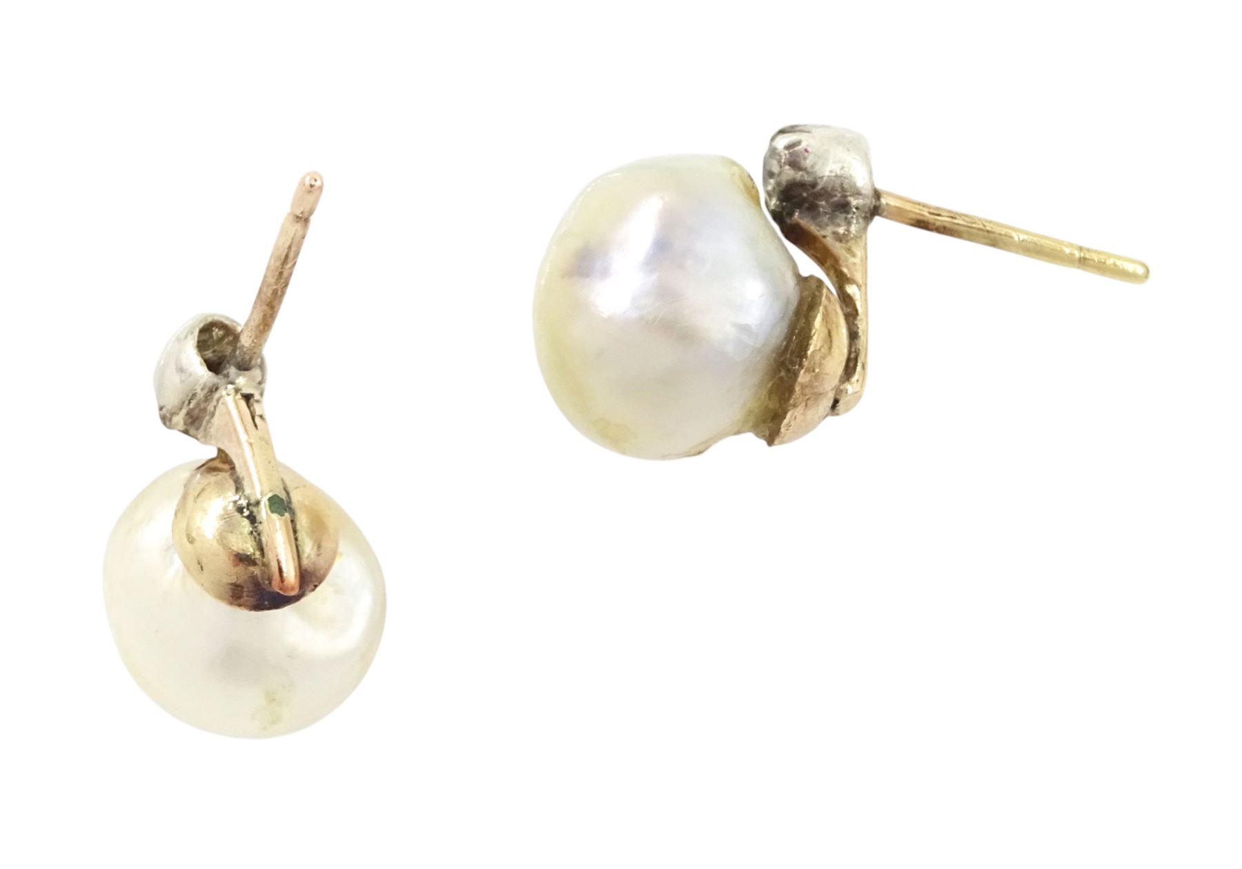 Pair of 19th / early 20th century natural saltwater pearl and diamond earrings, one stud set with a single white / cream pearl, the other with a white / grey / cream pearl, each suspending from a single old cut diamond, total pearl weight approx 4.30 carat