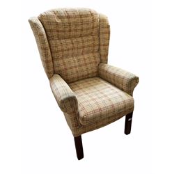 Wing back chair upholstered in beige check fabric 