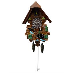 Battery operated cuckoo clock in a traditional chalet styled case with dummy weights, cuckoo, automata dancers and waterwheel. 