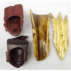  Two 19th/ early 20th century African carved bone face masks, H10cm and two Japanese hardwood Noh style masks (4) Provenance: private collection   