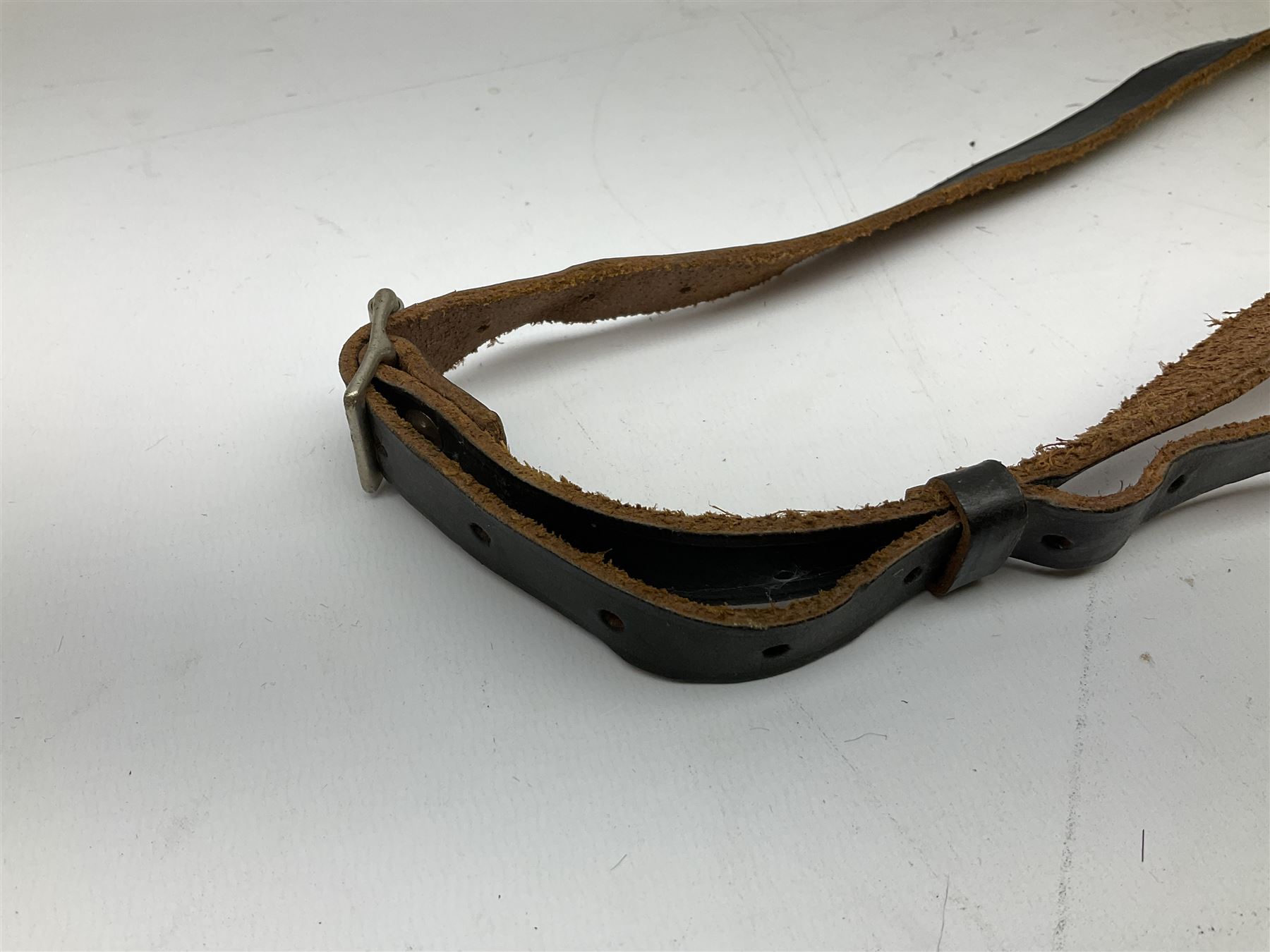 Pair of WWII German U-boat binoculars probably 7 x 50 by Leitz, with rubber eye piece protector covers and leather case stamped with Kriegsmarine mark to the lid and dated 1944, with leather strap.