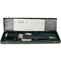 20th century Scottish Dirk, with Wilkinson Sword blade, with 29cm single edged etched blade, the leather sheath with white metal mounts in presentation box, overall L48cm 