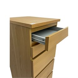 IKEA light oak finish chest, fitted with hinged vanity top, above six graduating drawers 