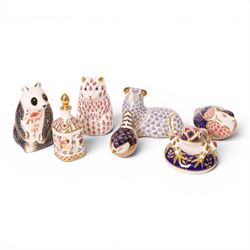 Six Royal Crown Derby paperweights, including Panda gold stopper, hamster silver stopper, ...