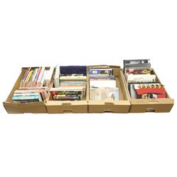 Collection of comics and graphic novels, to include The Penguin Book Of Comics paperback book by George Perry and Alan Aldridge, The Best of Li'l Abner, A Game of Thrones, together with film reference books etc, in four boxes  