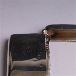 Edwardian silver cigarette and vesta case, each engraved 'XMAS 1902 from' above a noble cypher, both hallmarked Henry Matthews, vesta case Chester 1899, cigarette case Birmingham 1898, both with retailers stamps for Drew & Sons