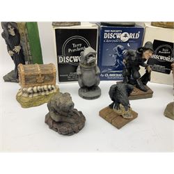 Terry Pratchett Discworld figures, comprising Roderick the hippo, DWE2, a 1995 event piece, Rincewind bookend, DW11, Death bookend, DW12, Librarians wizard knob, boxed, DW55, the luggage, boxed, DW04, tankard from the mended drum, DW21, Teppic the assassin, DW32, Greebo, DW45, Herne the hunted, DW64, Gaspode,  DW31, Quoth on skull, DW49 and Dibbler's compass DW16. 