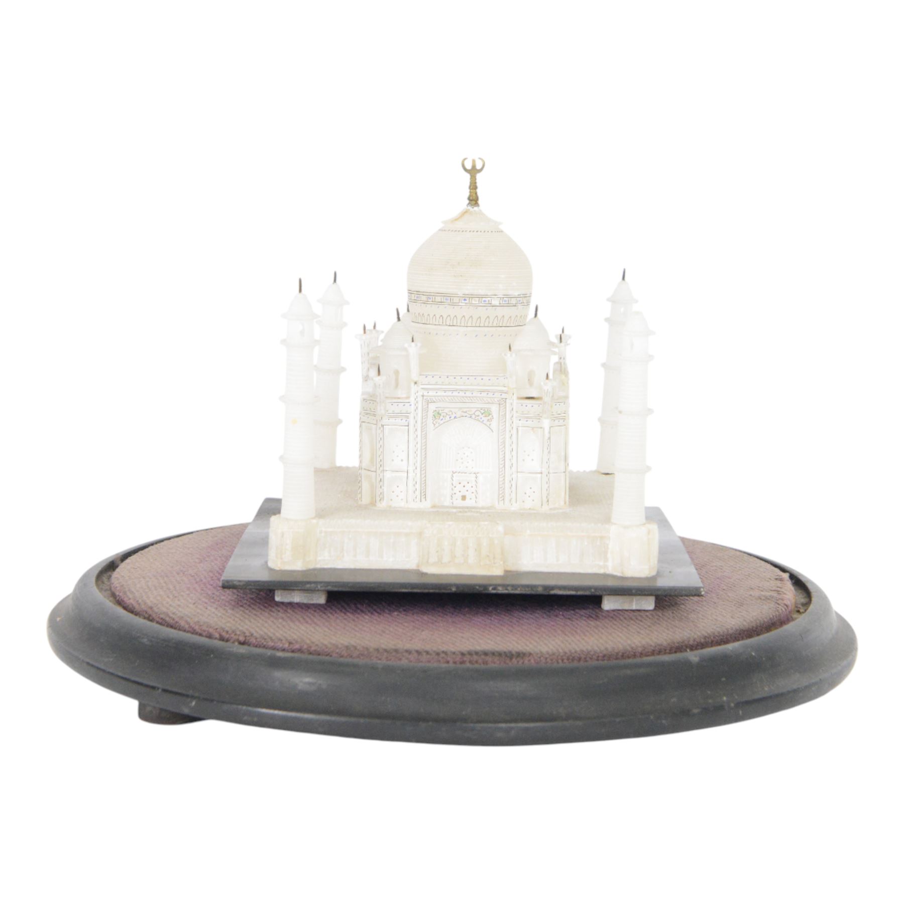 Early 20th century carved alabaster model of the Taj Mahal, early 20th century, under glass dome, raised on a velvet-lined and ebonised plinth, H26cm