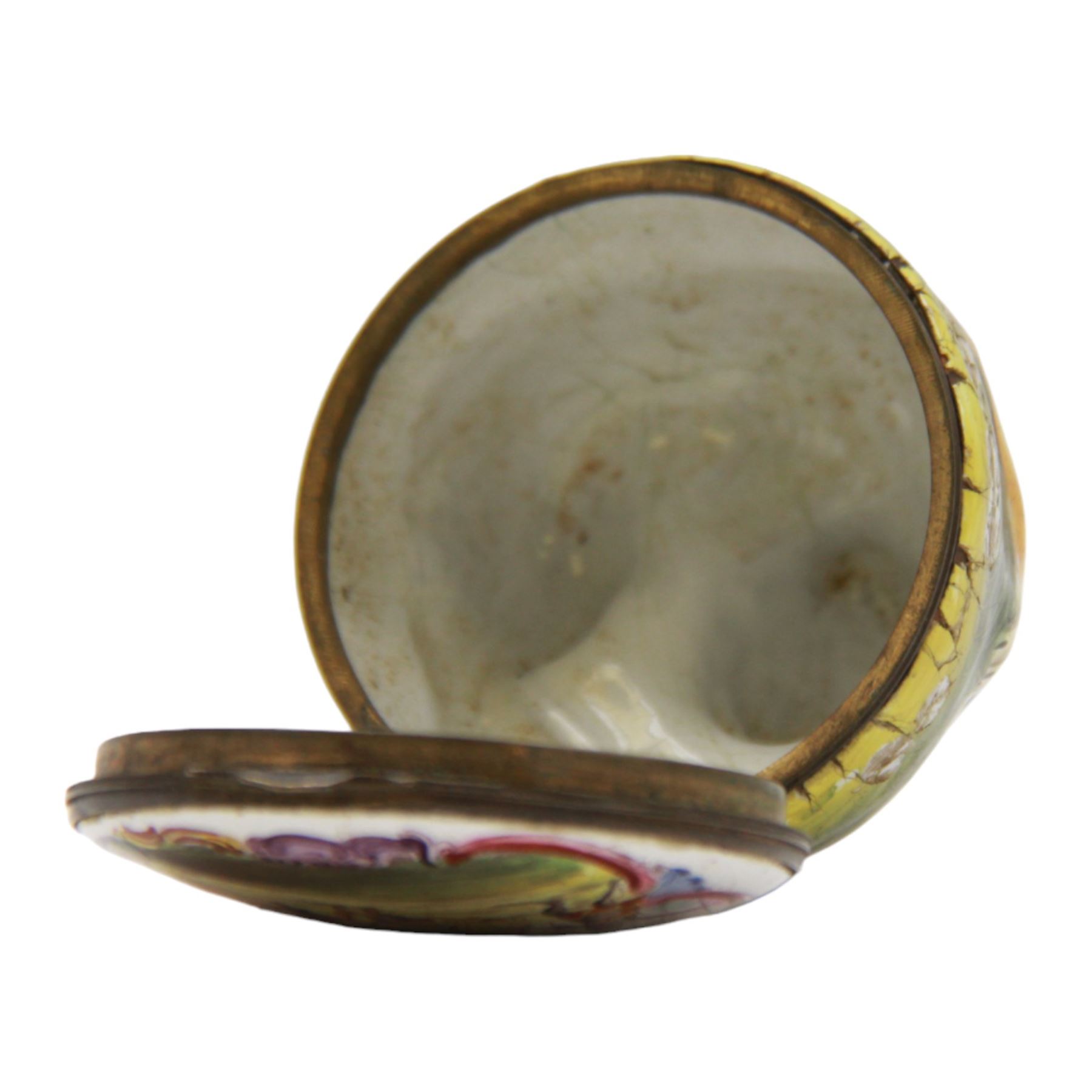 Rare 18th century Birmingham enamel bonbonniere, circa 1760, modelled as a grinning tiger laid upon a grassy sgraffito mound, the base decorated with a lion hunting scene after Antonio Tempesta, within a polychrome scroll surround, H5.5cm D6cm
