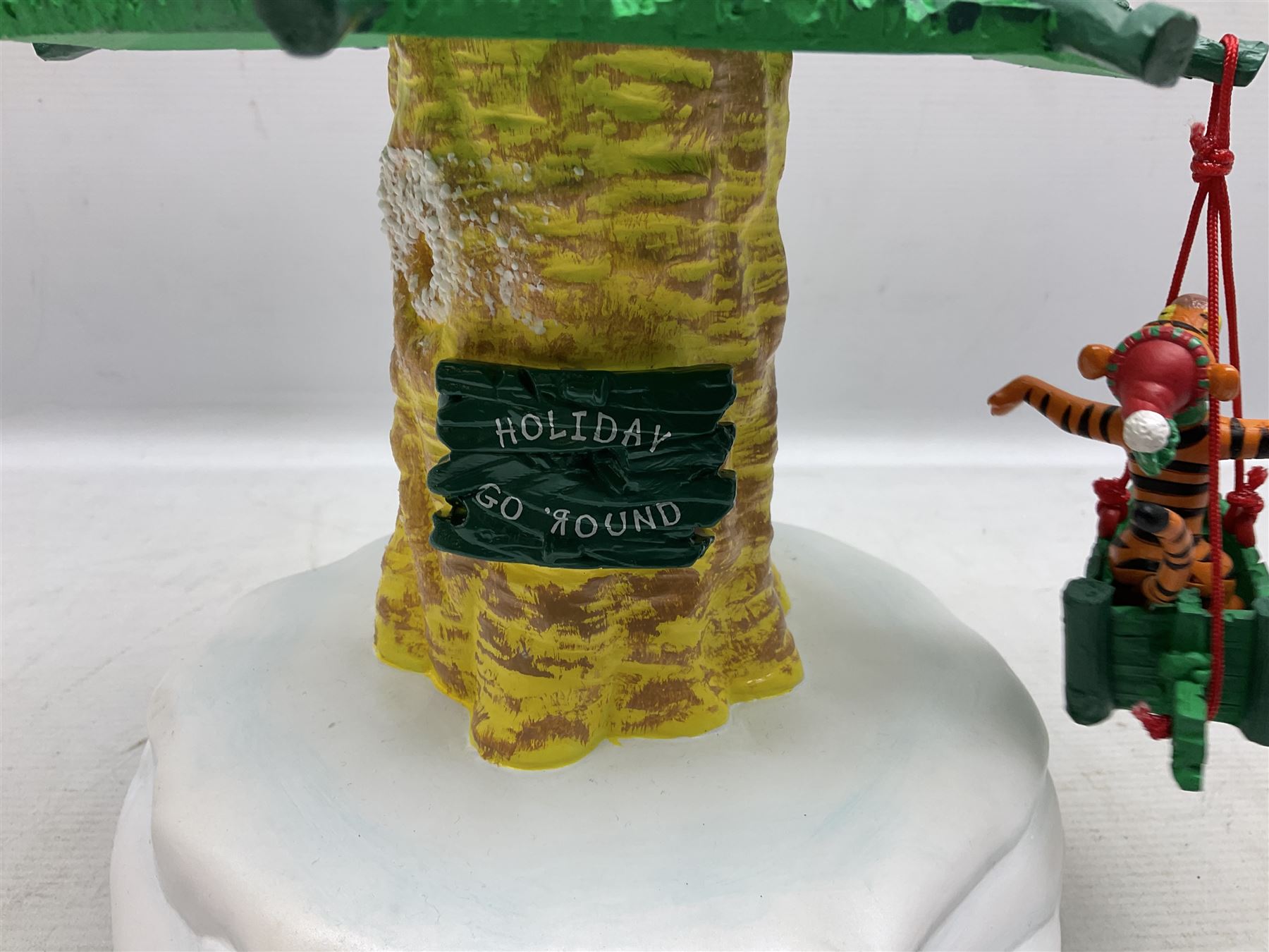 Six Disney Winnie the Pooh Christmas snow globes, comprising large Mr Christmas Holiday Snowfall, An Enchanted Christmas, It's A Small World Christmas 1994,  Tree Trimming, 1995 Christmas At Our House and Christmas Band Concert, together with Mr Christmas Holiday Go Round, all with boxes (7)