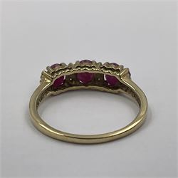 9ct gold three stone oval ruby and cubic zirconia ring, hallmarked and boxed 