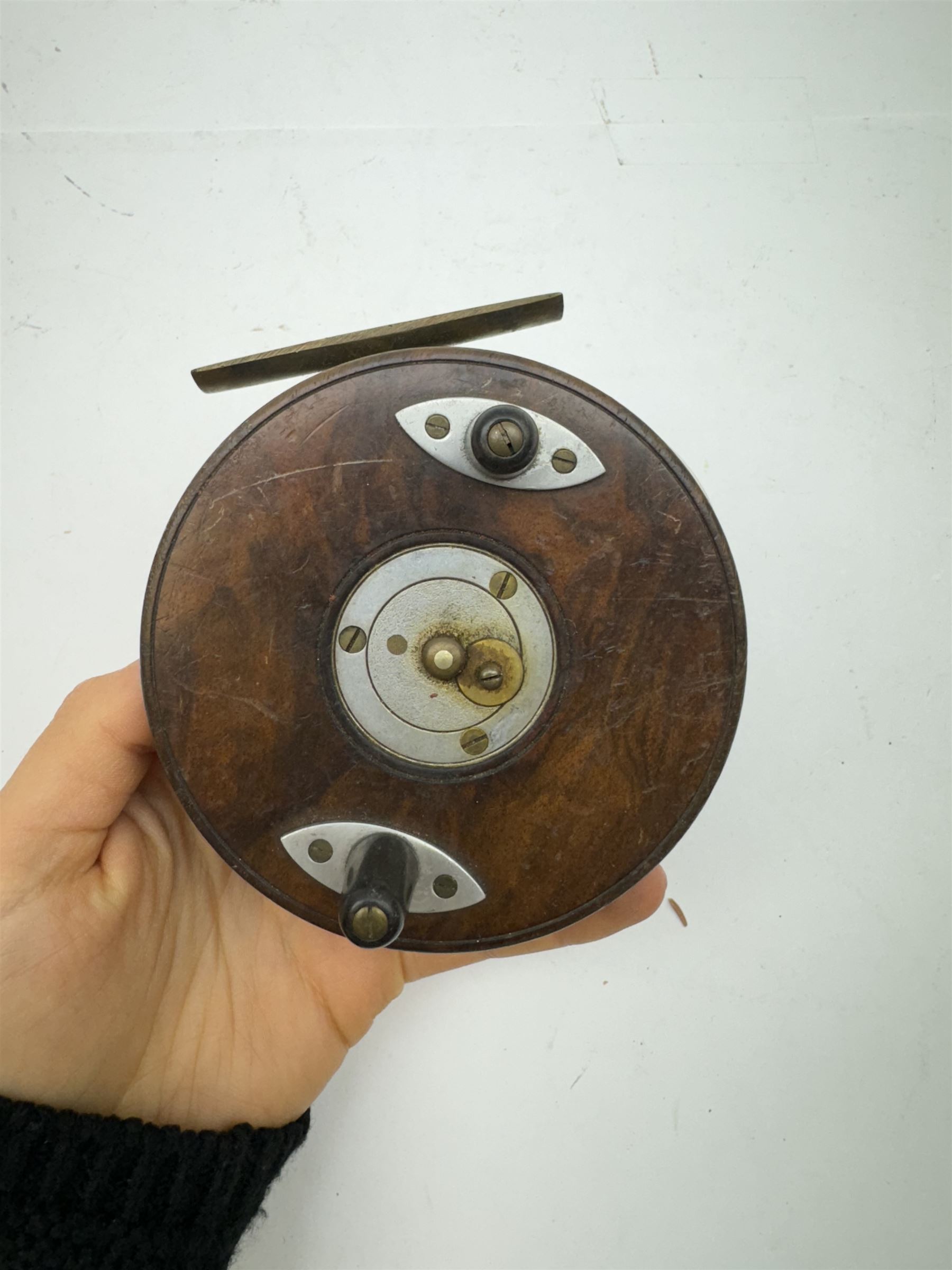 D. Slater, Newark, wood, alloy and brass star-back centre pin reel,  together with three other wooden/alloy reels including Edge Elite, Milbro Pelican and one other 