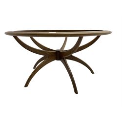 Victor B Wilkins for G-Plan - mid-20th century teak 'Astro' coffee table, raised on shaped X-frame base, no glass 