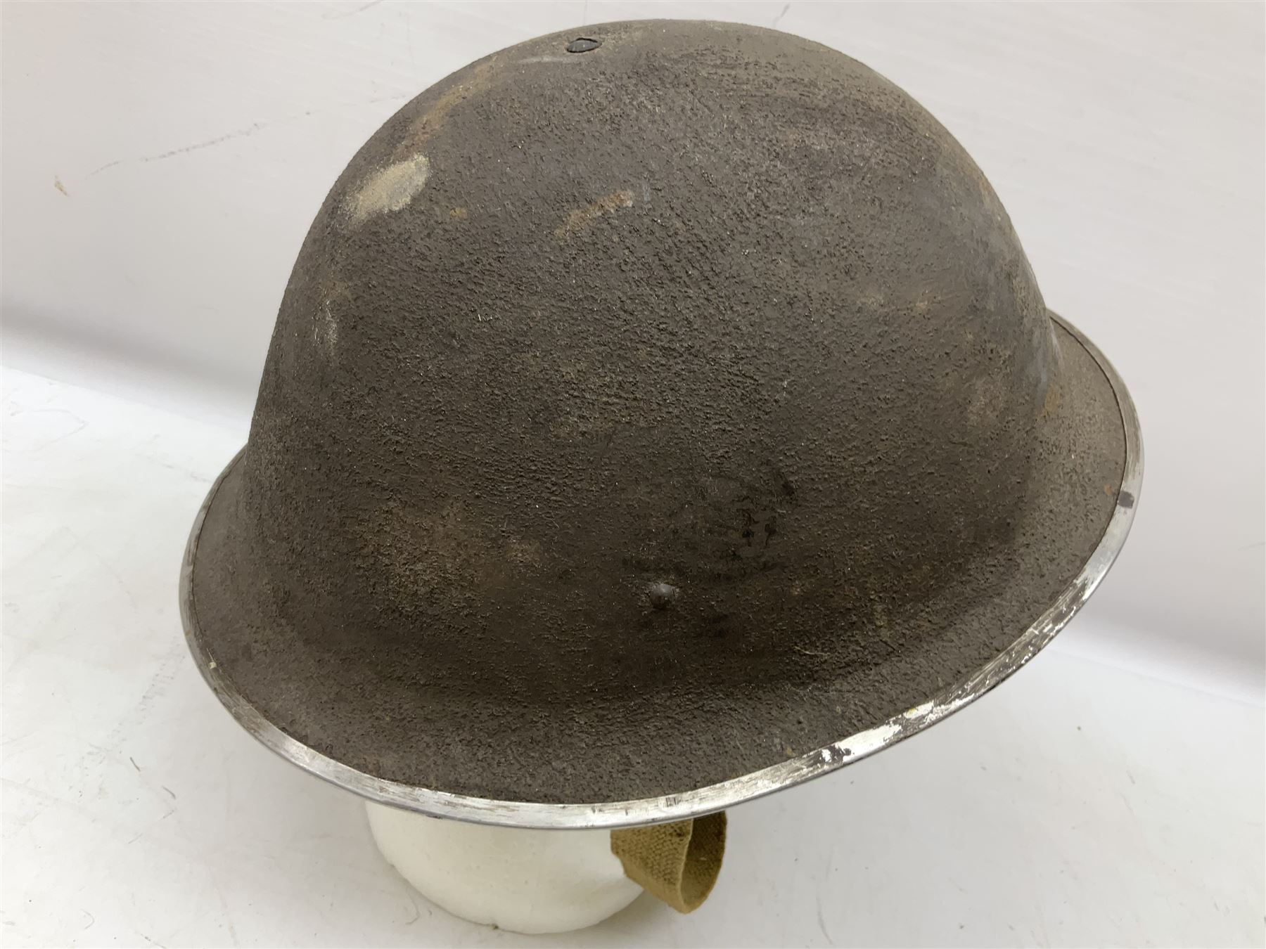 WW2 British Mk III steel combat helmet with textured finish and original liner