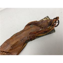 Saudi Arabian khanjar dagger with 29.5cm curving double edged  steel blade; white metal and copper mounted horn grip; in white metal mounted brass and leather scabbard incorporating embroidered leather wearing strap