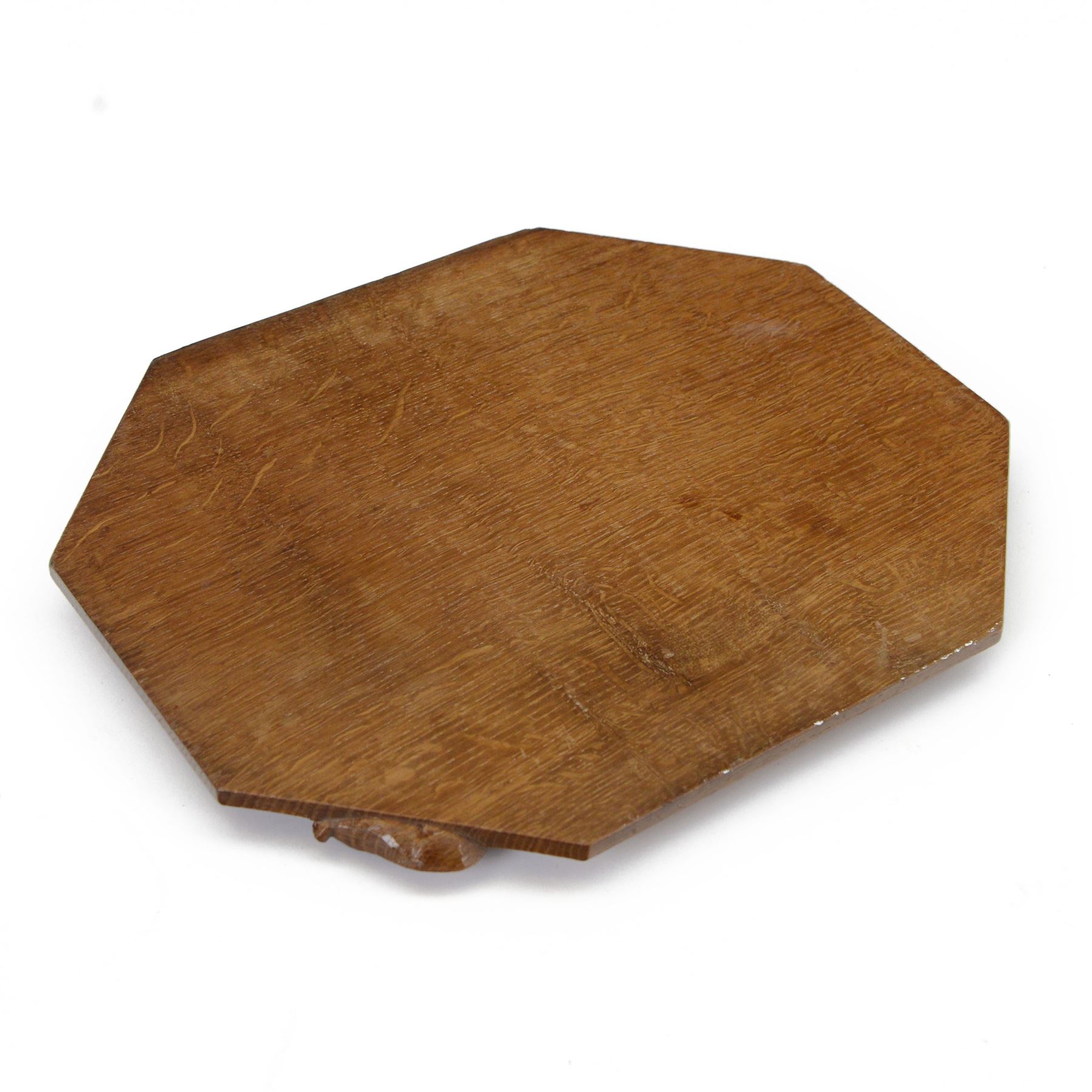 Mouseman - adzed oak breadboard or chopping board, canted rectangular form carved with mouse signature, by the workshop of Robert Thompson, Kilburn 