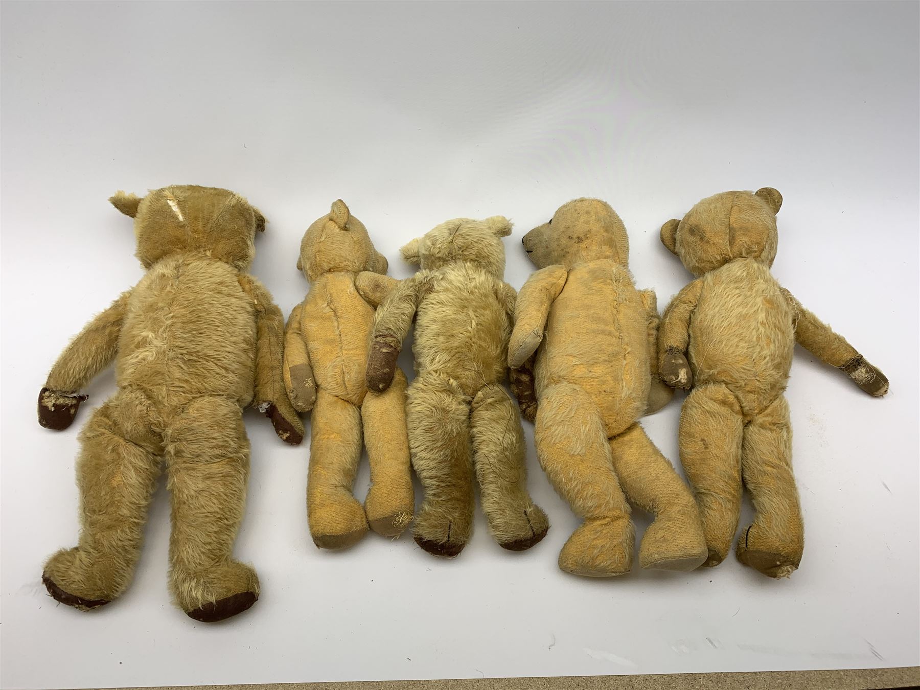 Five English teddy bears 1930s-50s, all well loved and playworn for restoration or spares/repair (5)
