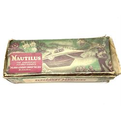 Sutcliffe Models ‘Nautilus’ tinplate and clockwork submarine from Walt Disney’s ’20,000 Leagues Under The Sea’ by Jules Verne, sea green body with various decals, rubber bung with periscope, boxed with inner cardboard display piece, produced between 1955-1960