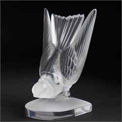 Lalique model of a swallow frosted glass bookend, inscribed 'Lalique France' H15.5, and 'pivoine' scented candle in box (2)