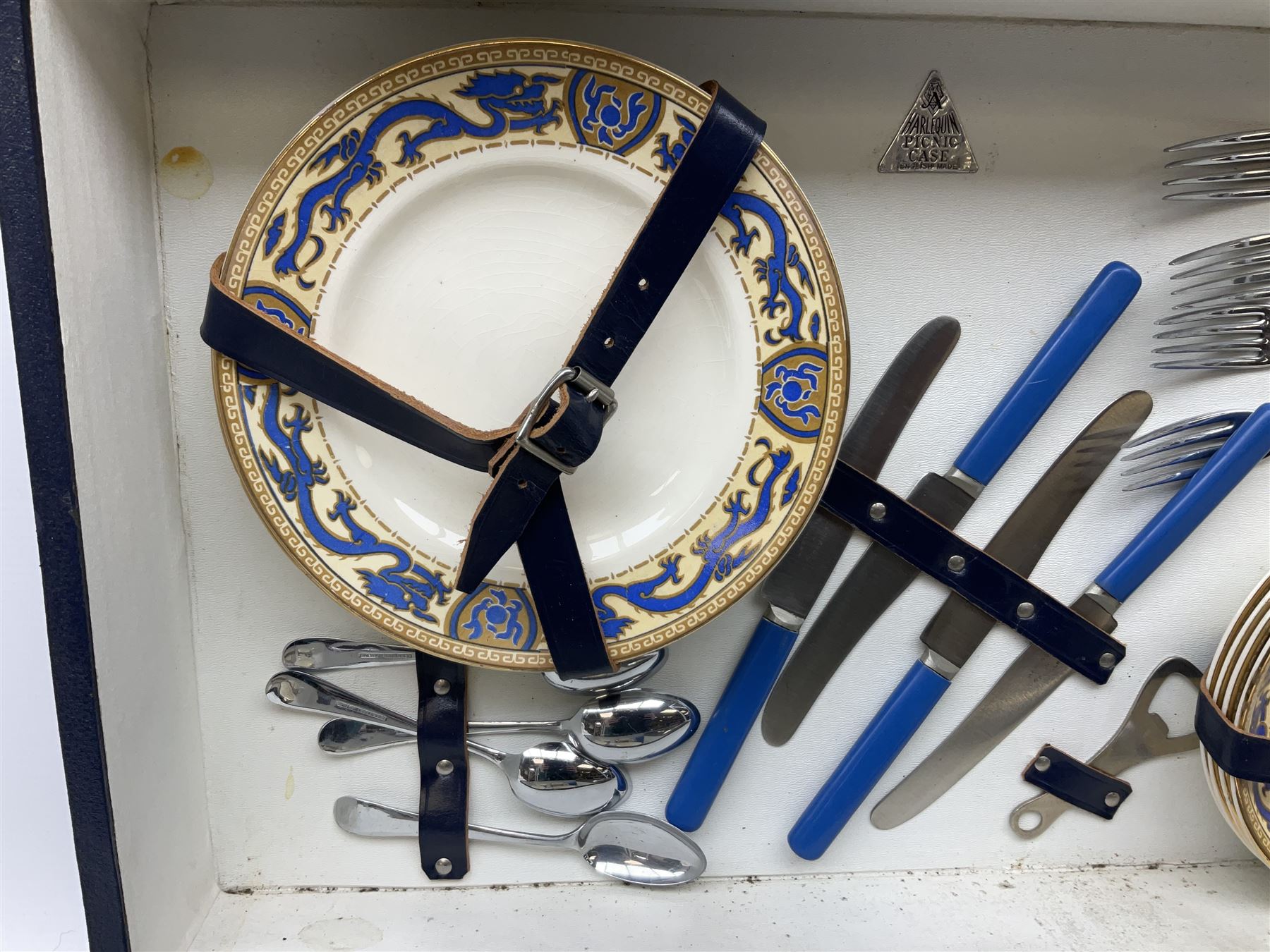 Vintage Harlequin picnic case, with tin sandwiches boxe, ceramic cups, plates, bowls and flatware for four settings, L48cm, H30cm